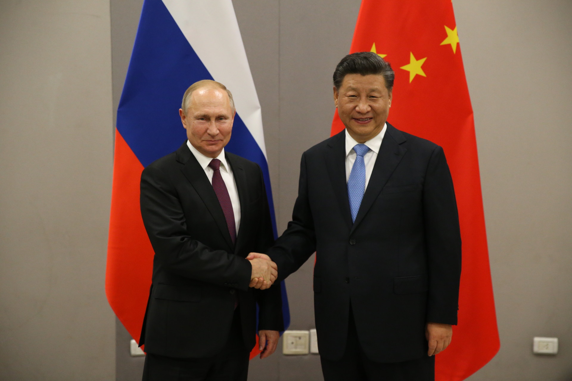 Russian President Vladimir Putin meets Chinese President Xi Jinping at BRICS Summit in Brasilia|Nav-Template