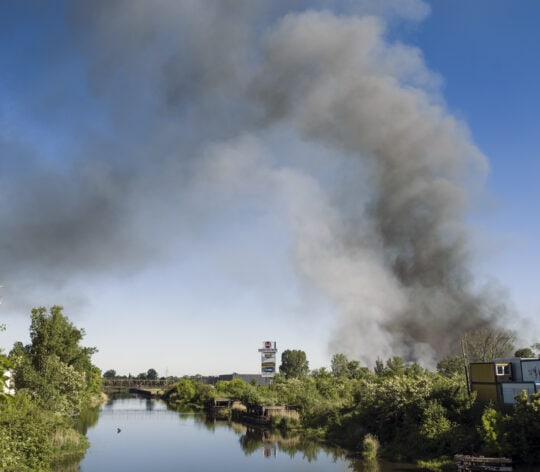 Black smoke seen in the sky above the burning Marywilska 44