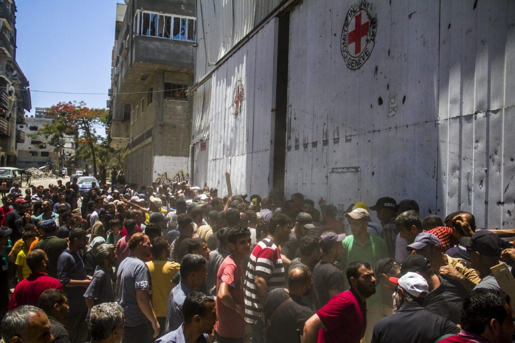 International Committee of the Red Cross distributes food aid to Palestinians in Gaza City