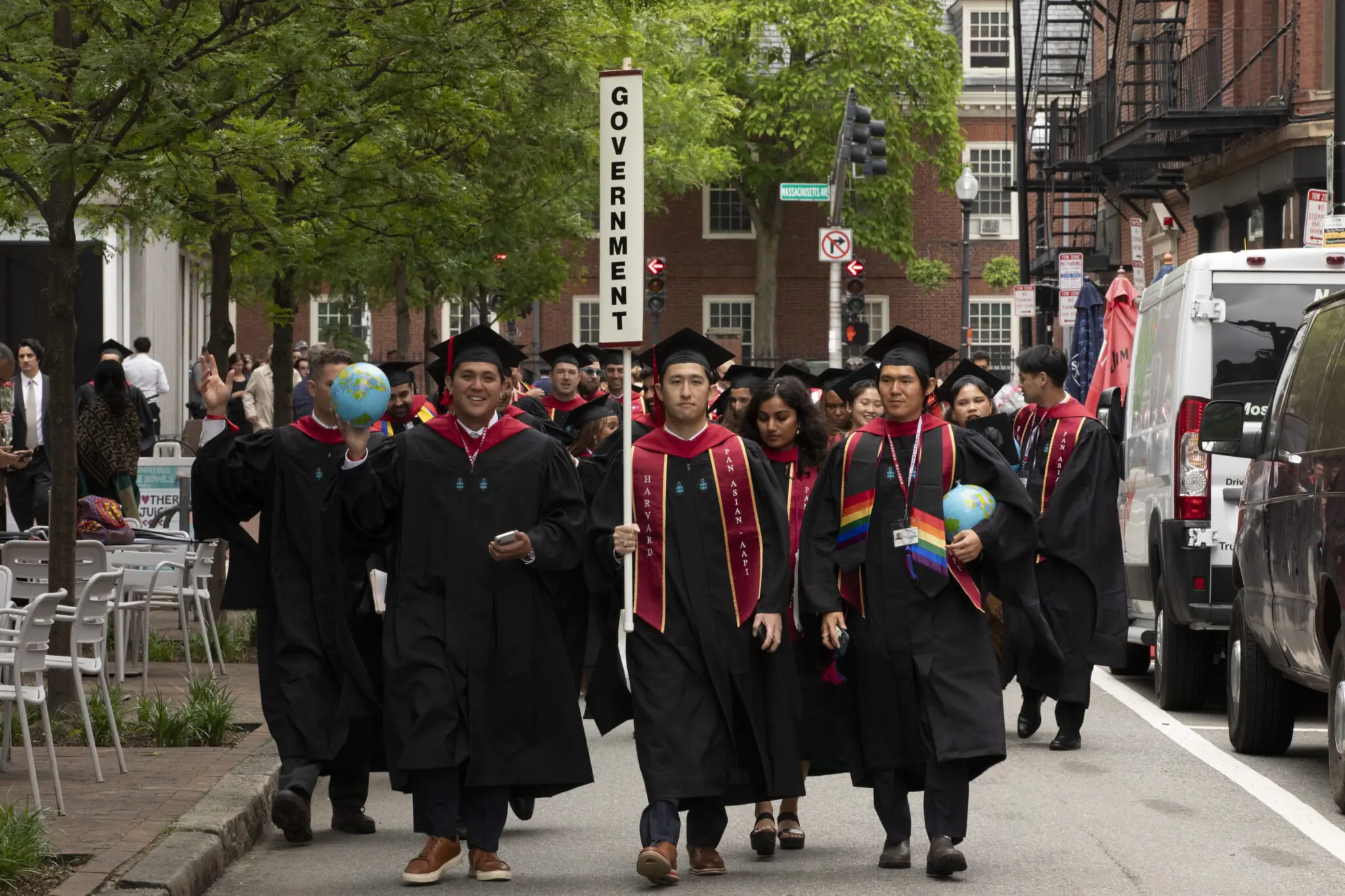 Demonstrators rally in Harvard square over University’s policies and investments