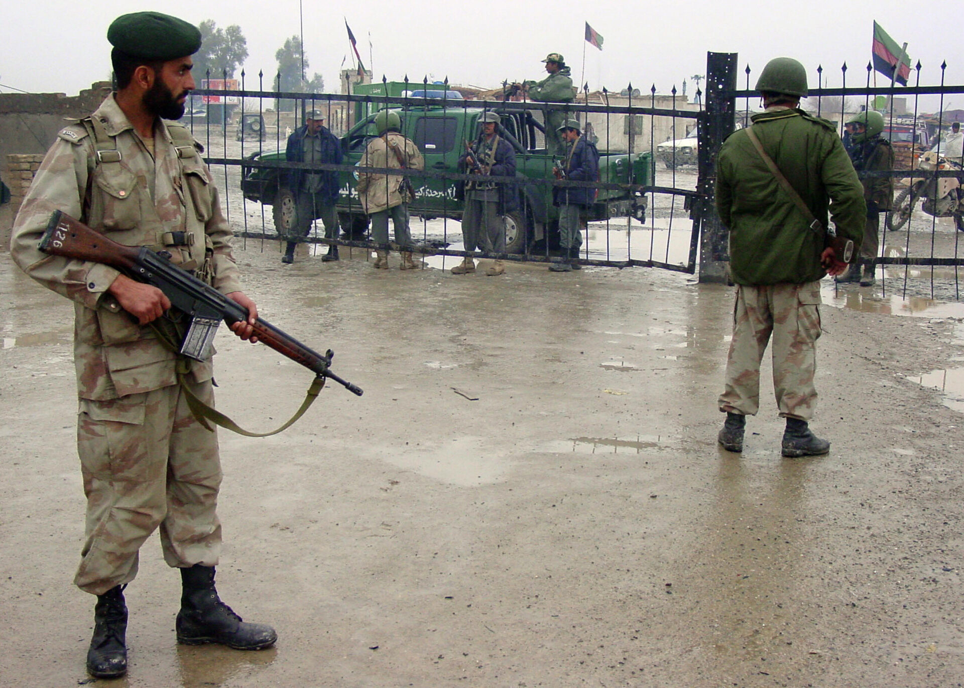 Pakistani paramilitary soldiers stand gu